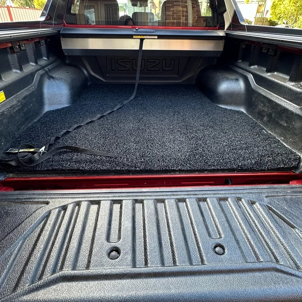 Shadow Black mat fitted inside Nicole's red Isuzu D-Max ute tub