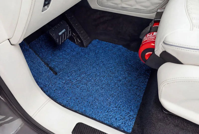 Stark Blue CarMatsCulture mat fitted edge to edge in a customer footwell